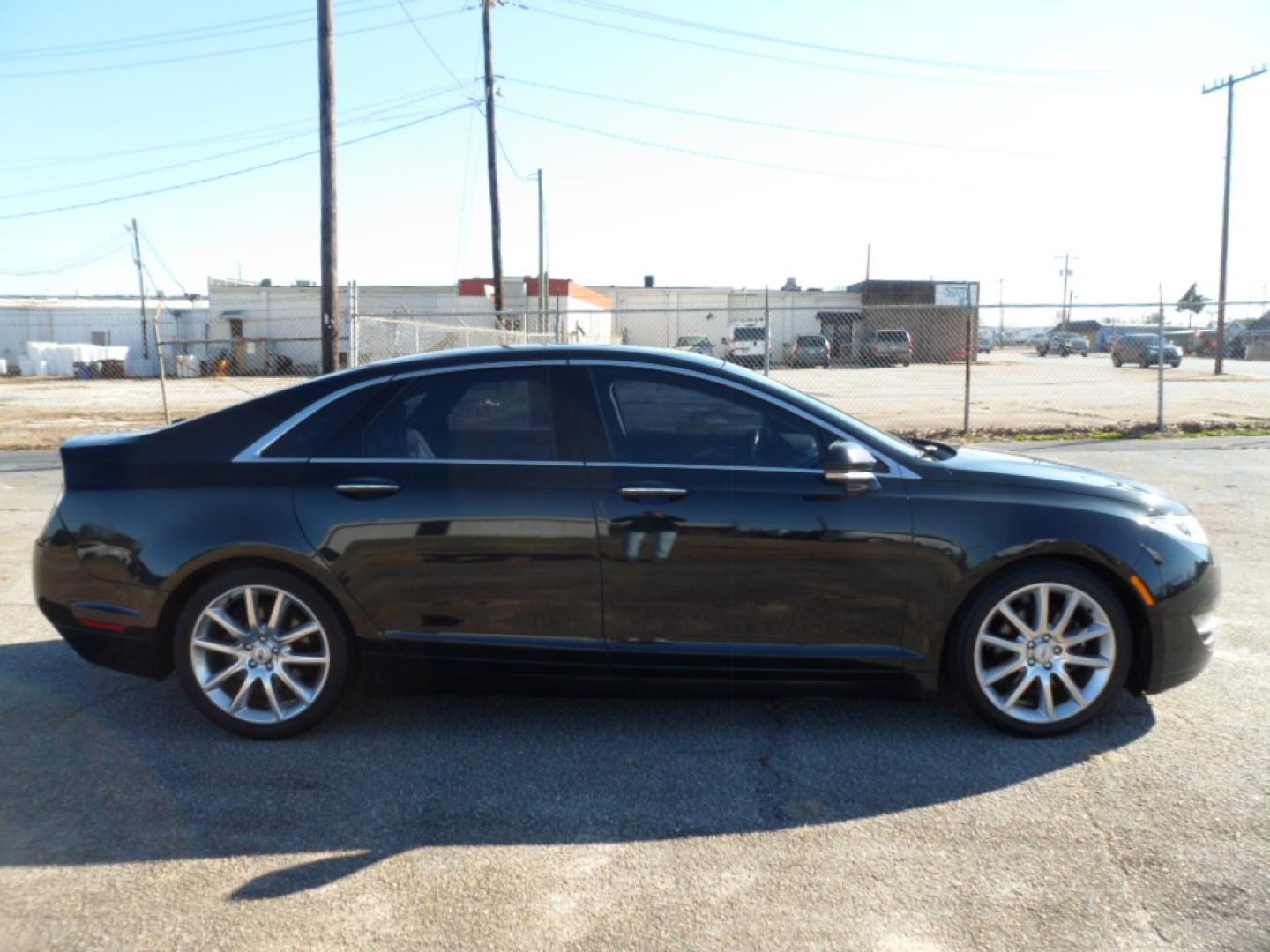 2014 BLACK /BLACK Lincoln MKZ (3LN6L2G9XER) , AUTOMATIC transmission, located at 2812 White Horse Road, Greenville, SC, 29611, (864) 269-1711, 34.808655, -82.434776 - 2.0 LITER 4 CYLINDER ENGINE,19 ICH ALLOY WHEELS,ANTI LOCK BRAKES,ANTI THEFT SYSTEM,TILT/REACH STEERING,2 ZONE A/C CLITMATE CONTROL,DUAL AIRBAGS,FRONT/REAR SIDE AIRBAGS,BODY COLOR BUMPERS,MIRRORS,AND DOOR HANDLES,CRUISE CONTROL,FOG LIGHTS,AUTOMATIC HEADLIGHTS,USB OUTLET,LIT VANITY MIRRORS,LEATHER SEA - Photo#2